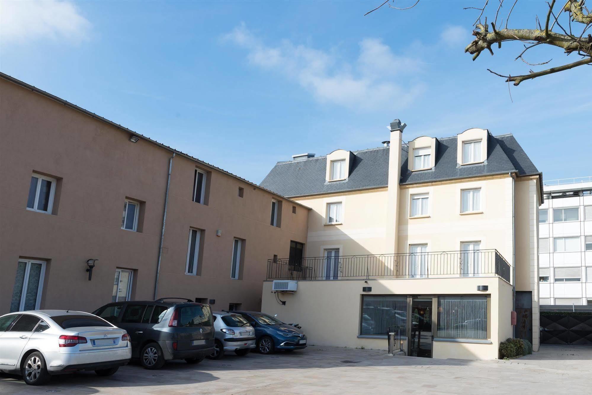 Hotel Le Saint Germain Aulnay-sous-Bois Bagian luar foto