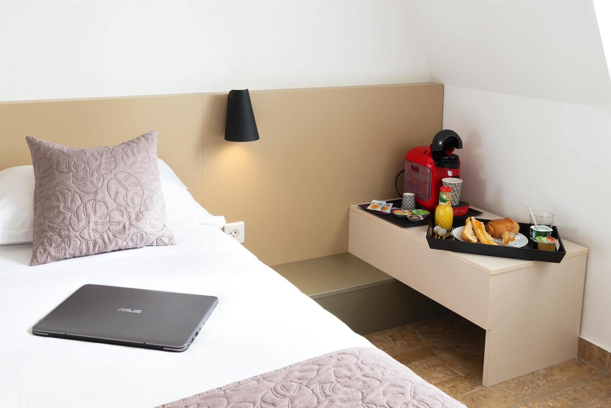 Hotel Le Saint Germain Aulnay-sous-Bois Bagian luar foto