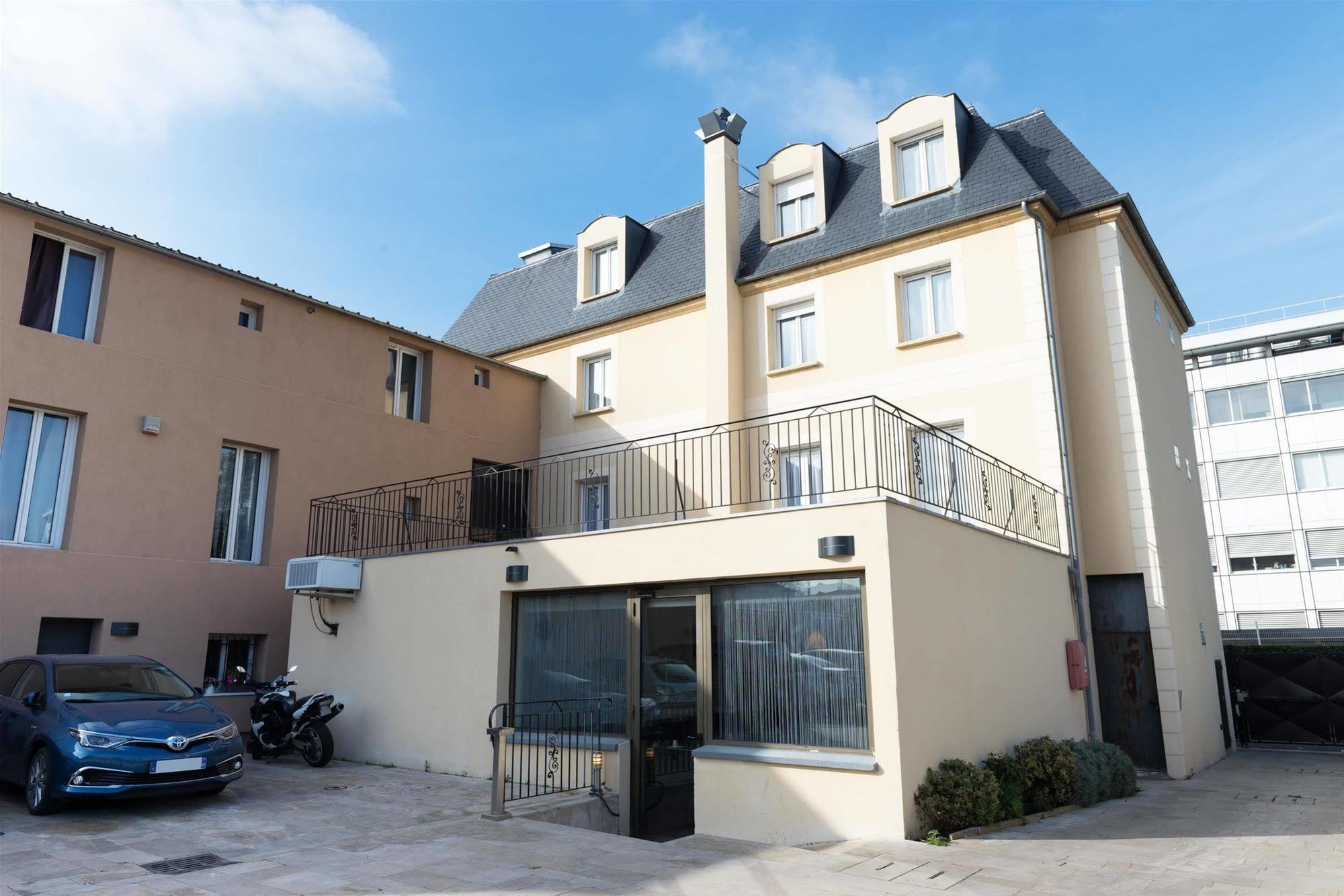 Hotel Le Saint Germain Aulnay-sous-Bois Bagian luar foto